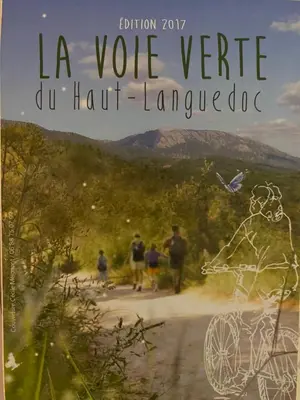 a book cover of people walking down a dirt road at Le Cottage in Mazamet
