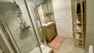 a bathroom with a shower and a sink at L'annexe spa du Tropical Lodge in Narbonne