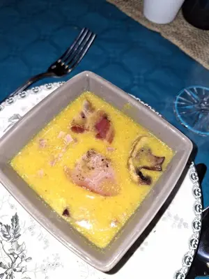 a bowl of food on a plate on a table at Bessire Chambres & table d'hôtes in Belflou