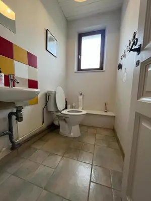 a bathroom with a toilet and a sink at Le Villerouge - 14 Personnes - Piscine in Fabrezan