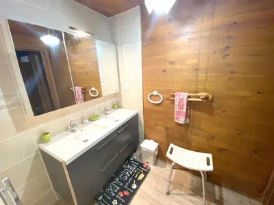 a bathroom with a sink and a mirror at Maison de campagne à Camps-sur-l'Agly avec vue sur lac in Camps-sur-lʼAgly