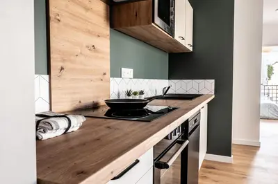 a kitchen with a counter with a bowl on it at T2 Le Miredames in Castres