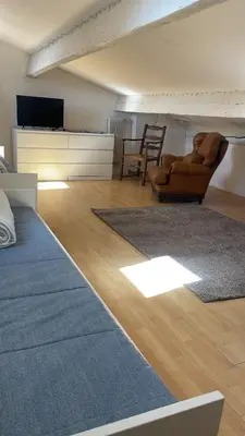a living room with a couch and two chairs at Magnifique villa 11 couchages in Narbonne