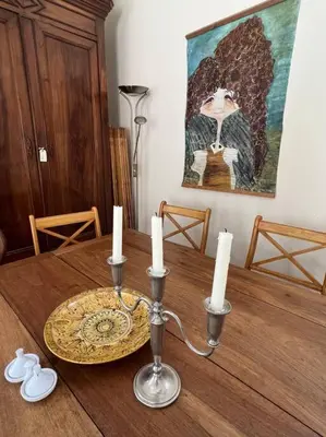 a dining room table with candles on top of it at The hat factory in Espéraza