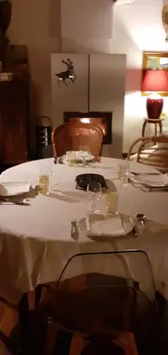 a table with a white table cloth on top of it at grande terrasse avec vue entre méditerranée et pays cathare in Cailla
