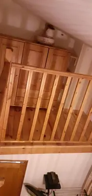 a ceiling in a room with wooden cabinets at grande terrasse avec vue entre méditerranée et pays cathare in Cailla
