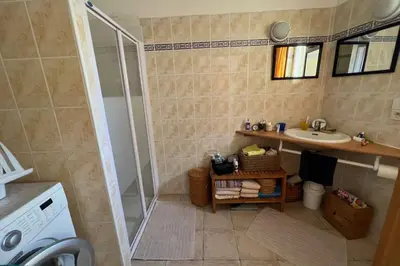 a bathroom with a shower and a sink at La Lucquette - House near the Grands Buffets in Narbonne