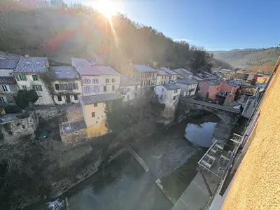 an aerial view of a city with a bridge at Studio Rennes les bains au pied des Thermes in Rennes-les-Bains