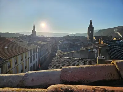 a view of a city with roofs of buildings at La terrasse des Augustins in Limoux