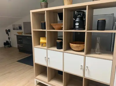 a wooden shelf with a coffee maker on it at Magnifique appartement T2 en Centre VILLAGE in Saverdun
