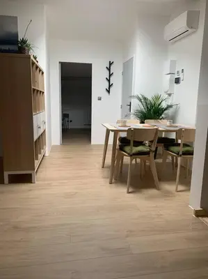 a dining room with a table and chairs at Magnifique appartement T2 en Centre VILLAGE in Saverdun
