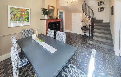 a dining room with a blue table and chairs at Nice Home In Saint-Chinian With Wifi in Saint-Chinian