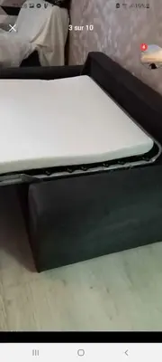 a close up of a mattress on a bed frame at Un Petit Coin Douillet au Pradel in Montredon-Labessonnié