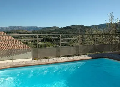 a swimming pool with a view of the mountains at Superb villa for 4, private pool in Durban-Corbières