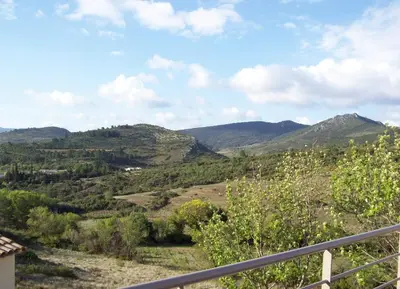 a view of a valley with mountains in the background at Superb villa for 4, private pool in Durban-Corbières