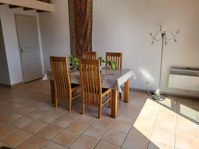 a dining room with a table and four chairs at Superb villa for 4, private pool in Durban-Corbières