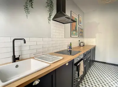 a kitchen with a sink and a counter top at 2 bedrooms apartment - Perfect for a city getaway in Carcassonne
