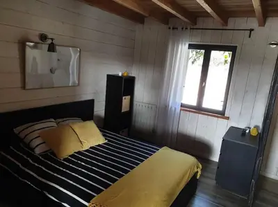 a bedroom with a bed and a window at Villa contemporaine à la campagne - Promo rentrée in Saint-Papoul