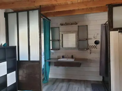 a bathroom with a sink and a mirror at Villa contemporaine à la campagne - Promo rentrée in Saint-Papoul