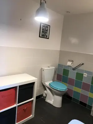 a bathroom with a toilet and a sink at BelCiano (ancien Toit Vert) in Fitou
