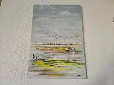 a painting hanging on a wall with birds at Logis des Palmiers YourHostHelper in Gruissan