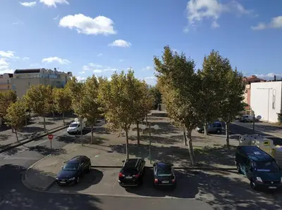 a group of cars parked in a parking lot at Studio L'air marin in Gruissan