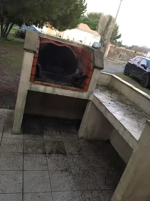 a brick oven sitting on top of a sidewalk at Gîte aux Aspres Logement de 65m² (4pers) in Fontcouverte