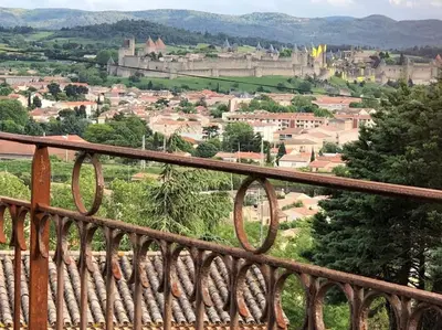 a view of a city from auliculiculiculiculiculiculiculiculic at Maison de charme avec vue sur la cité médiévale. in Carcassonne