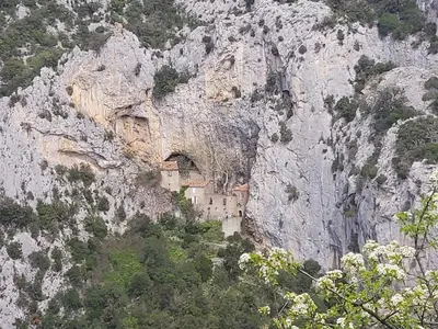 a building on the side of a mountain at hOMe-Shanti Galamus -- Relais Rando - vélo - moto in Saint-Paul-de-Fenouillet