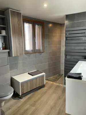 a bathroom with a tub and a toilet and a shower at Chez Tony et Laurie in Montbrun-des-Corbières