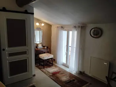 an empty room with a door and a window at Cozy self contained modern home near Carcassonne in Badens