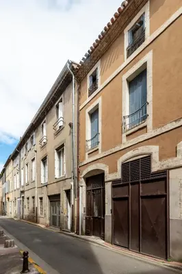 a row of buildings on the side of a street at Le Coste - Free parking - Central - Wifi -netflix in Carcassonne