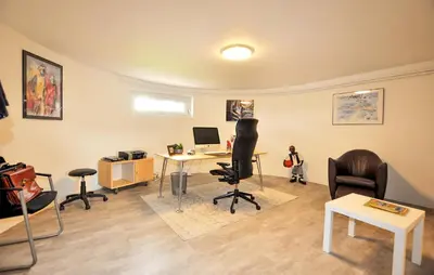 a room with chairs and a desk with a computer at 2 Bedroom Cozy Home In Tabre in Tabre
