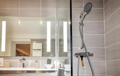 a shower with a shower head in a bathroom at 2 Bedroom Cozy Home In Tabre in Tabre