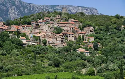 a village on the side of a mountain at 2 Bedroom Lovely Home In St-Laurent-De-La-Carbr in Saint-Laurent-de-la-Cabrerisse