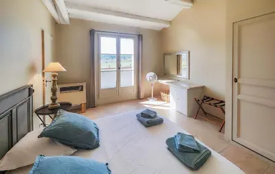 a living room with a couch and a window at Amazing Home In Saint-Laurent-De-La-Ca in Saint-Laurent-de-la-Cabrerisse