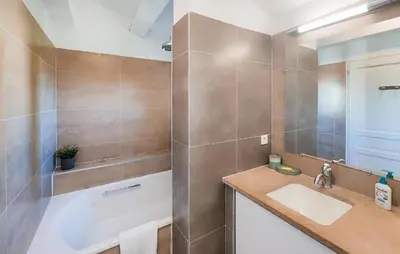 a bathroom with a sink and a shower and a tub at Amazing Home In Saint-Laurent-De-La-Ca in Saint-Laurent-de-la-Cabrerisse