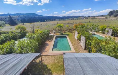 an overhead view of a swimming pool in a garden at Stunning Home In Saint-Laurent-De-La-Ca in Saint-Laurent-de-la-Cabrerisse
