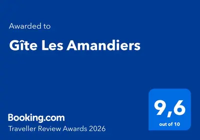 a blue sign with the text emailed to gift less amateurs at Gîte Les Amandiers in Villedubert
