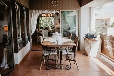 a dining room with a table and chairs at Belle demeure de charme in Montels