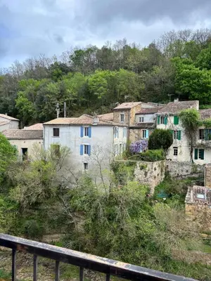 a group of buildings on the side of a hill at Rennes-les-Bains Studio at Thermal Baths in Rennes-les-Bains