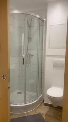 a bathroom with a shower and a toilet at Grands Buffets hébergement Studio Narbonne in Narbonne