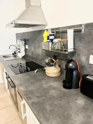 a kitchen with a sink and a counter top at Studio centre historique RDC - WIFI in Revel