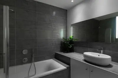 a bathroom with a sink and a bath tub at Appartement chic, hôtel particulier, Carcassonne centre in Carcassonne