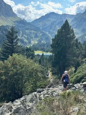 a view of a lake with a mountain in the background at Bol d'air à Mijanès in Mijanès