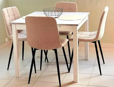 a white dining table with four chairs and a white table at Vagues et Vignes Gruissan Appt T2 bien placé tout équipé WIFI avec parking privé in Gruissan