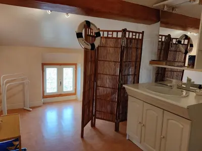 a kitchen with a sink and a counter top at Chambre d'hôte chez l'habitant à la campagne in Cambounet-sur-le-Sor