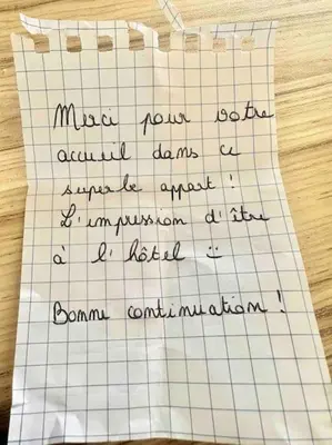 a piece of paper with handwriting on it on a table at Élégance Lauragaise * Wifi * Netflix * Terrasse in Villefranche-de-Lauragais