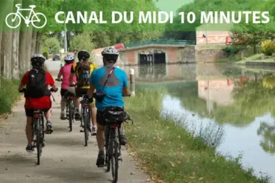 a group of people riding bikes down a path at Élégance Lauragaise * Wifi * Netflix * Terrasse in Villefranche-de-Lauragais