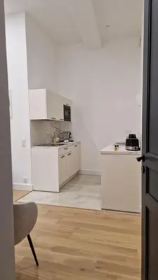 a kitchen counter with a sink and a coffee maker at Situation exceptionnelle HARMONY III in Carcassonne